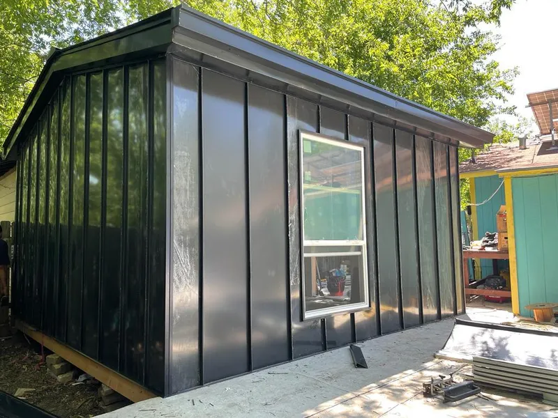 Black standing seam metal wall panels for Roof Inspection in Casa Grande